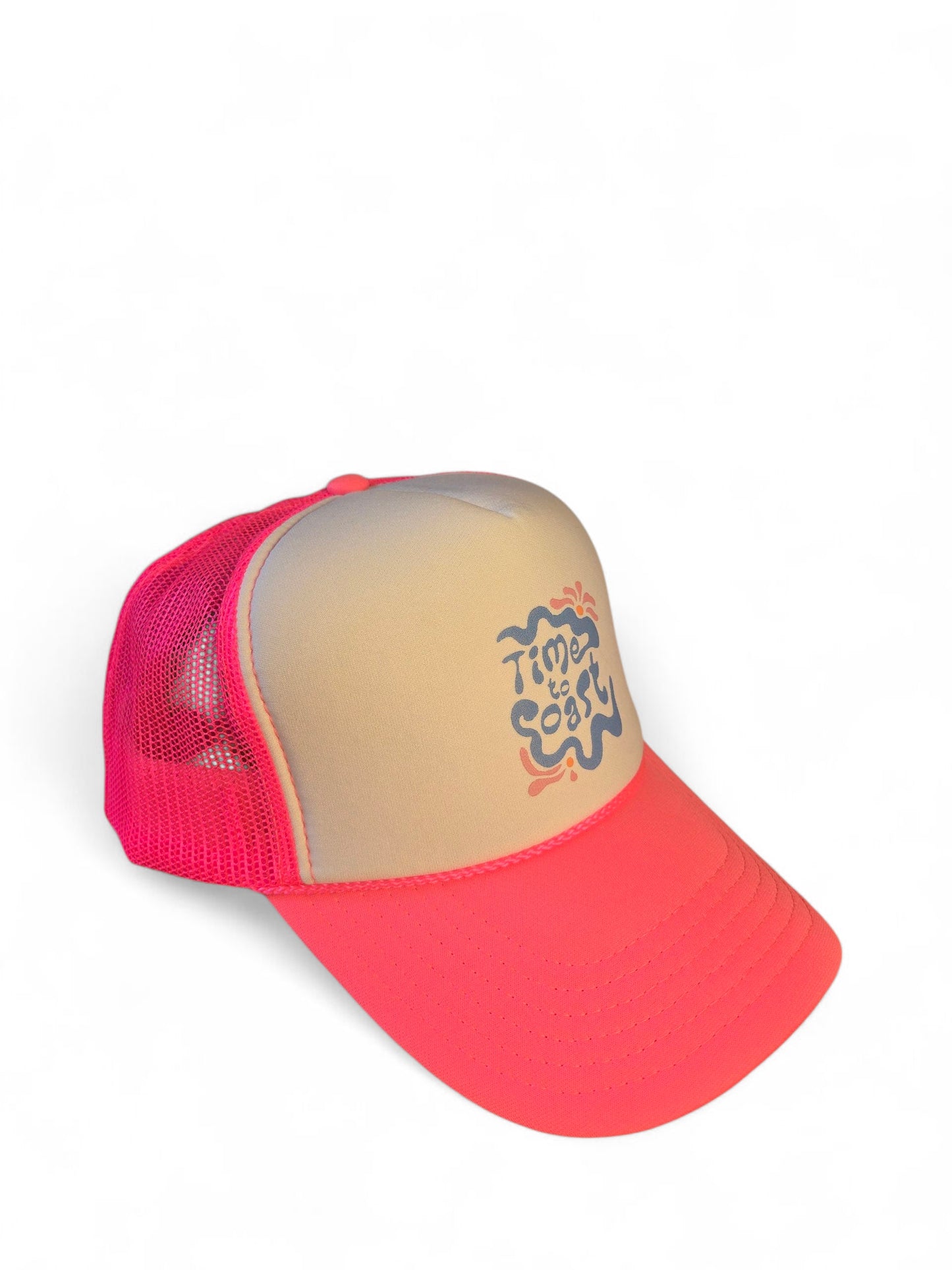 Side view laydown of a foam high profile trucker hat. Graphic is printed with Time to Coast Hippy Wave. Hat color is bright pink bill and mesh back with white front.
