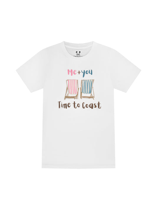 White laydown of  a woman's  t-shirt in organic cotton made in USA. Homegrown t-shirt with a large front graphic of 2 beach chairs, one pink other light blue with Me + You saying and Time to Coast Logo.