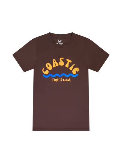 Bark or brown laydown of graphic  t-shirt in organic cotton made in USA. Homegrown t-shirt with large graphic, of the word Coastie in orange with blue waves at the bottom. Small Time to Coast Logo in Orange. 