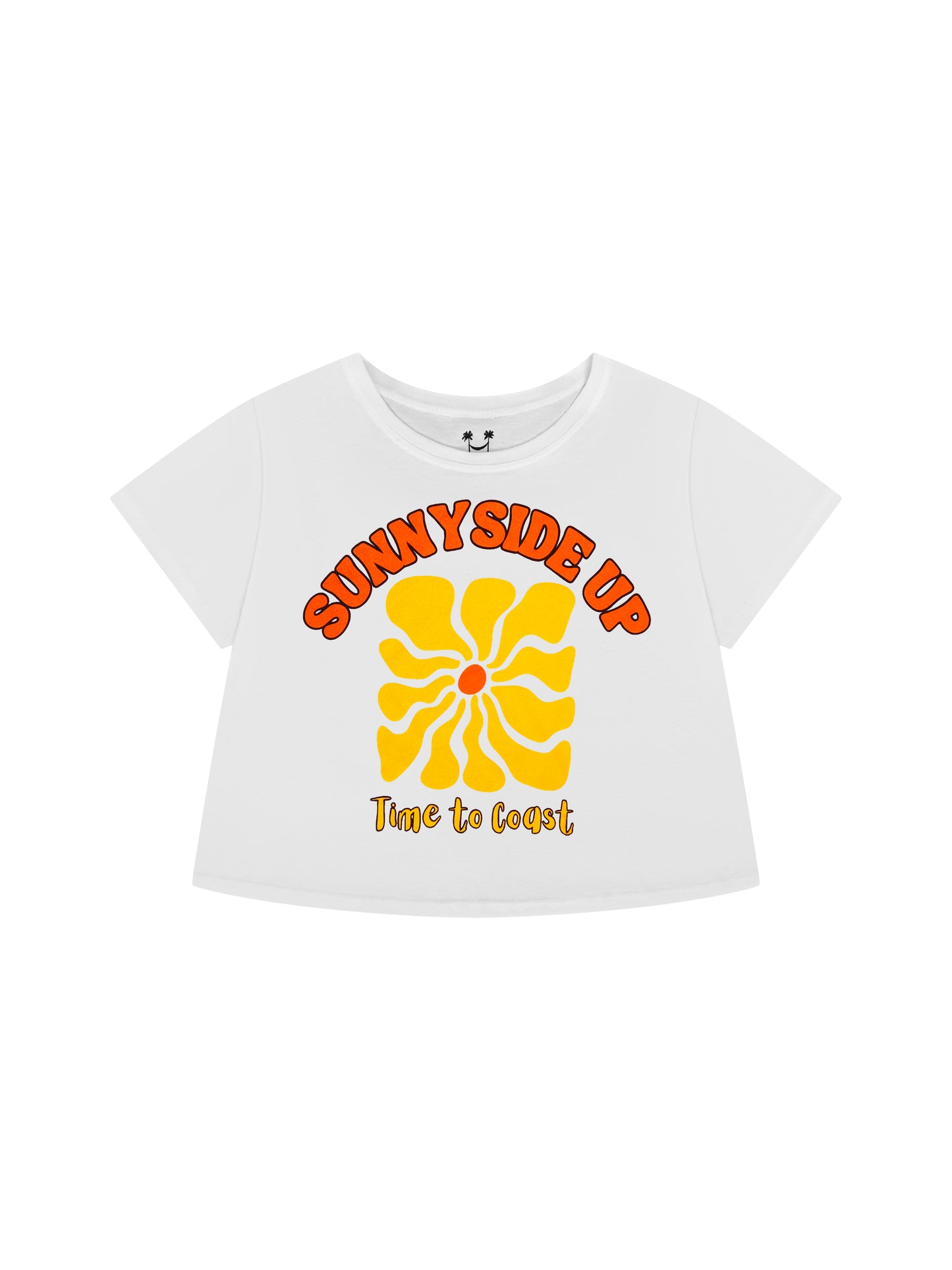 Laydown of a white Time to Coast Palm Cloth crop tee. Graphic is Sunnyside Up Sun, in yellow and orange colors.  