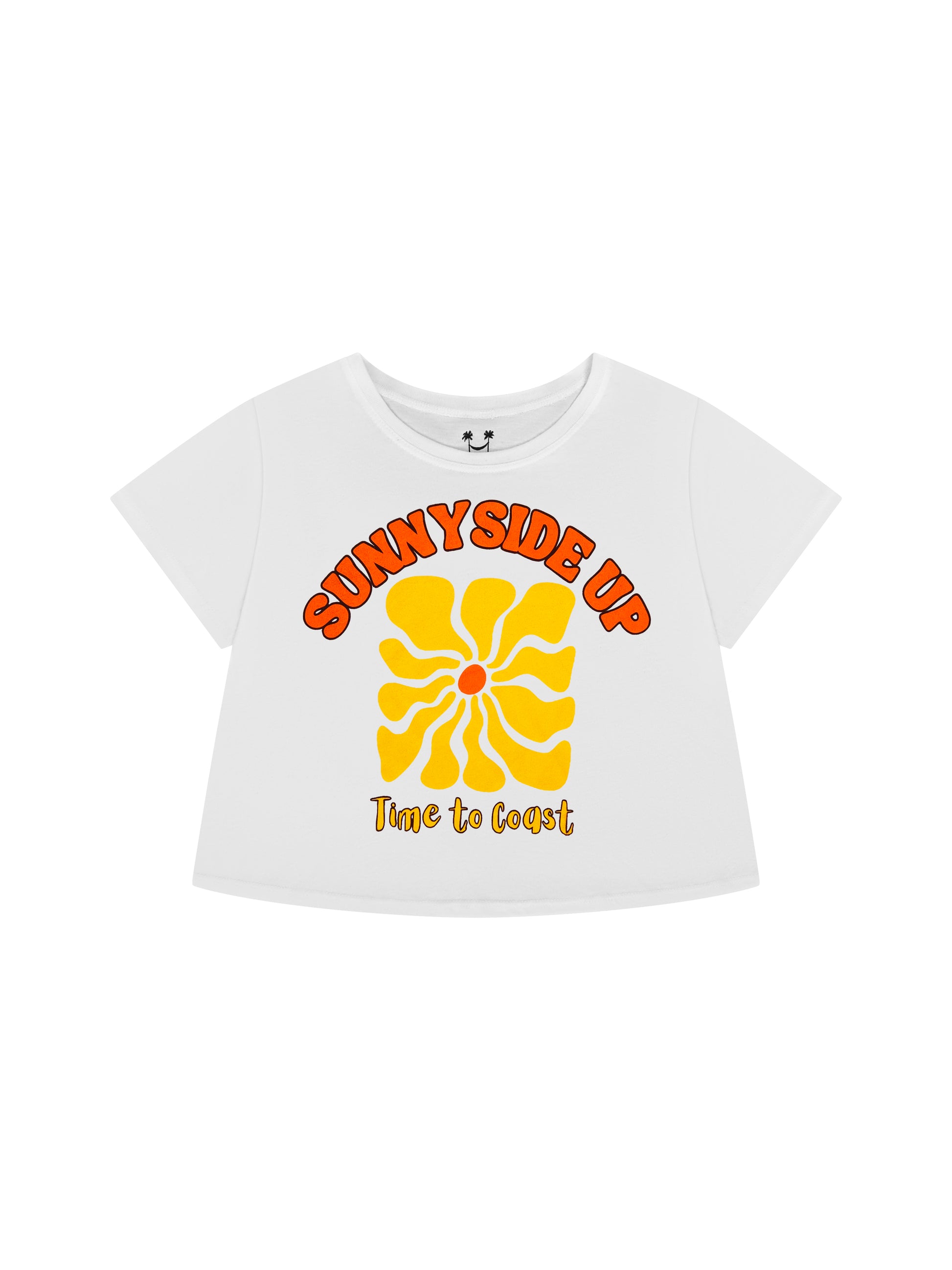 Laydown of a white Time to Coast Palm Cloth crop tee. Graphic is Sunnyside Up Sun, in yellow and orange colors.  