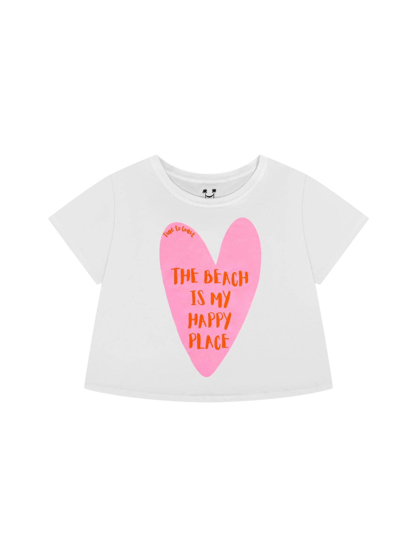 Laydown of a white Time to Coast Palm Cloth crop tee. Graphic is a heart with beach is my happy place slogan. Heart color is pink with red wording. 