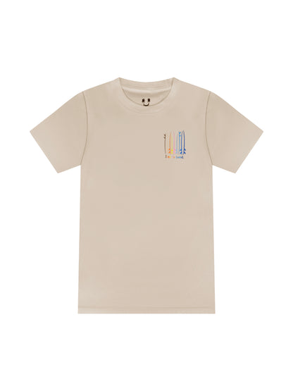 Creme laydown of a unisex  graphic  t-shirt in organic cotton made in USA. Homegrown t-shirt shown with left chest graphic multi color surf and sup boards with Time to Coast Logo.  