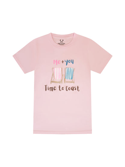 Light pink laydown of  a woman's  t-shirt in organic cotton made in USA. Homegrown t-shirt with a large front graphic of 2 beach chairs, one pink other light blue with Me + You saying and Time to Coast Logo.