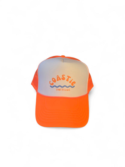 Laydown of a foam high profile trucker hat.  Graphic is printed with Time to Coast Coastie with waves. Hat color is bright orange bill and mesh back with white front. 