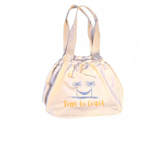 Laydown of the Florida Fleece Hobo Beach Bag, with drawstring closure. Creme colored with Time to Coast Logo Graphic with light blue palm trees and hammock with a yellow sun and Time to Coast.